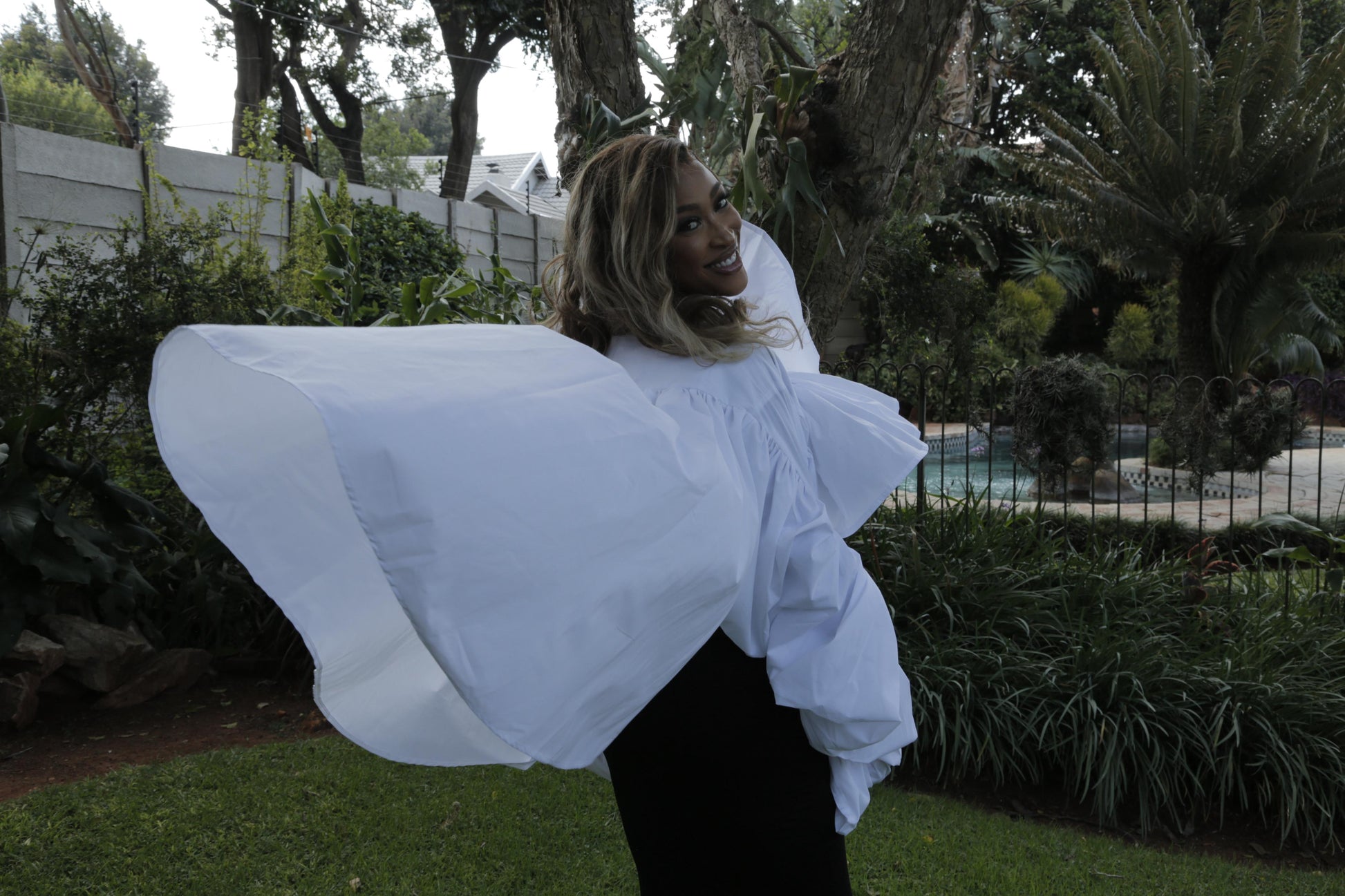 Flared dramatic linen top