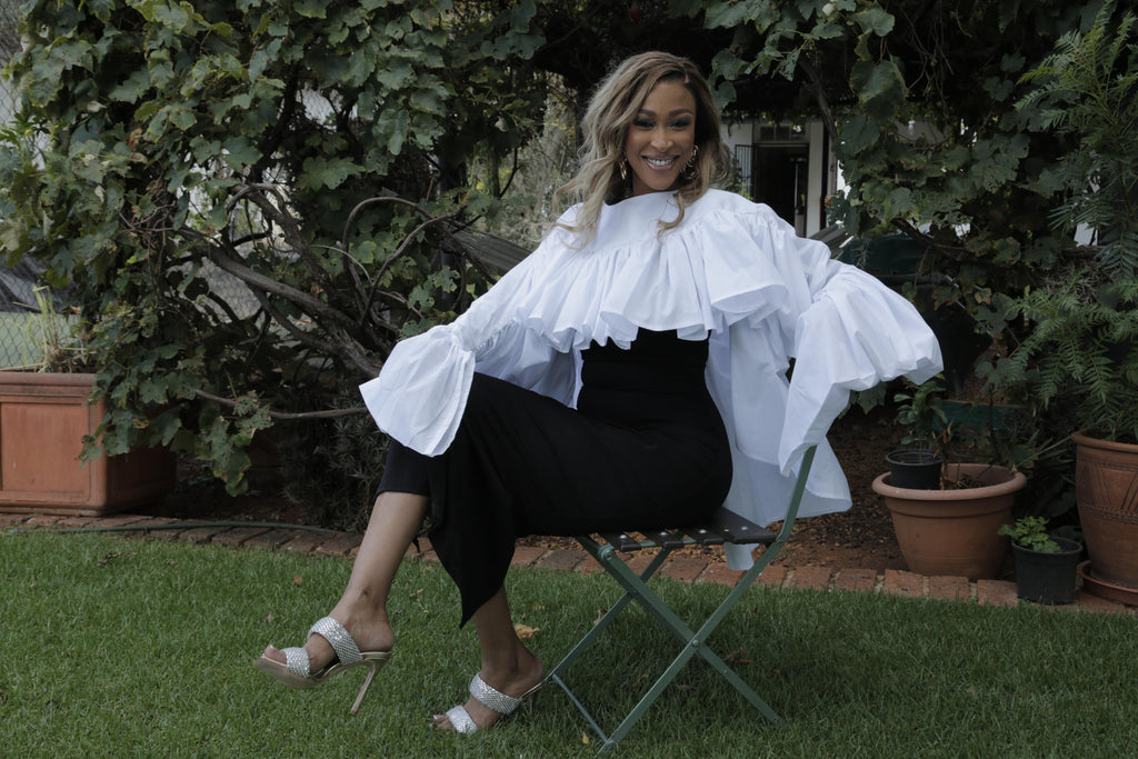 Flared dramatic linen top