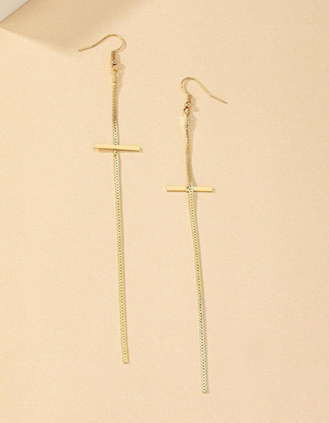 Crucifix string earrings