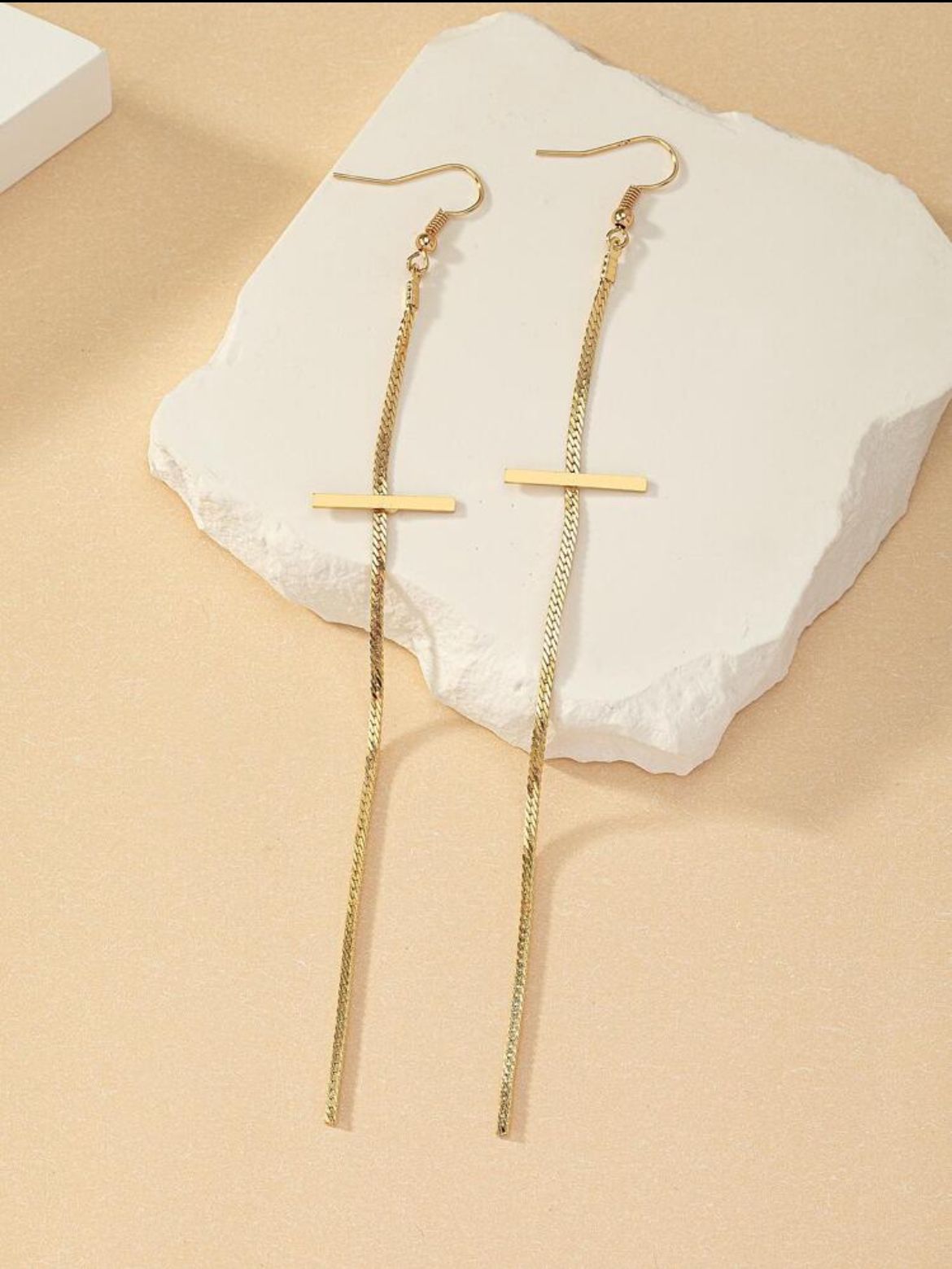 Crucifix string earrings